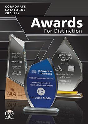Montage of glass awards for excellence and distinction, with a blue curved trophy in the center and a dark geometric background.